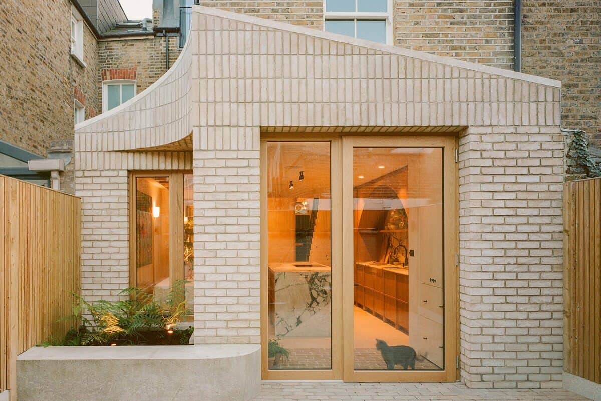 Classic timber balcony doors at the Hidden Courtyard brick extension