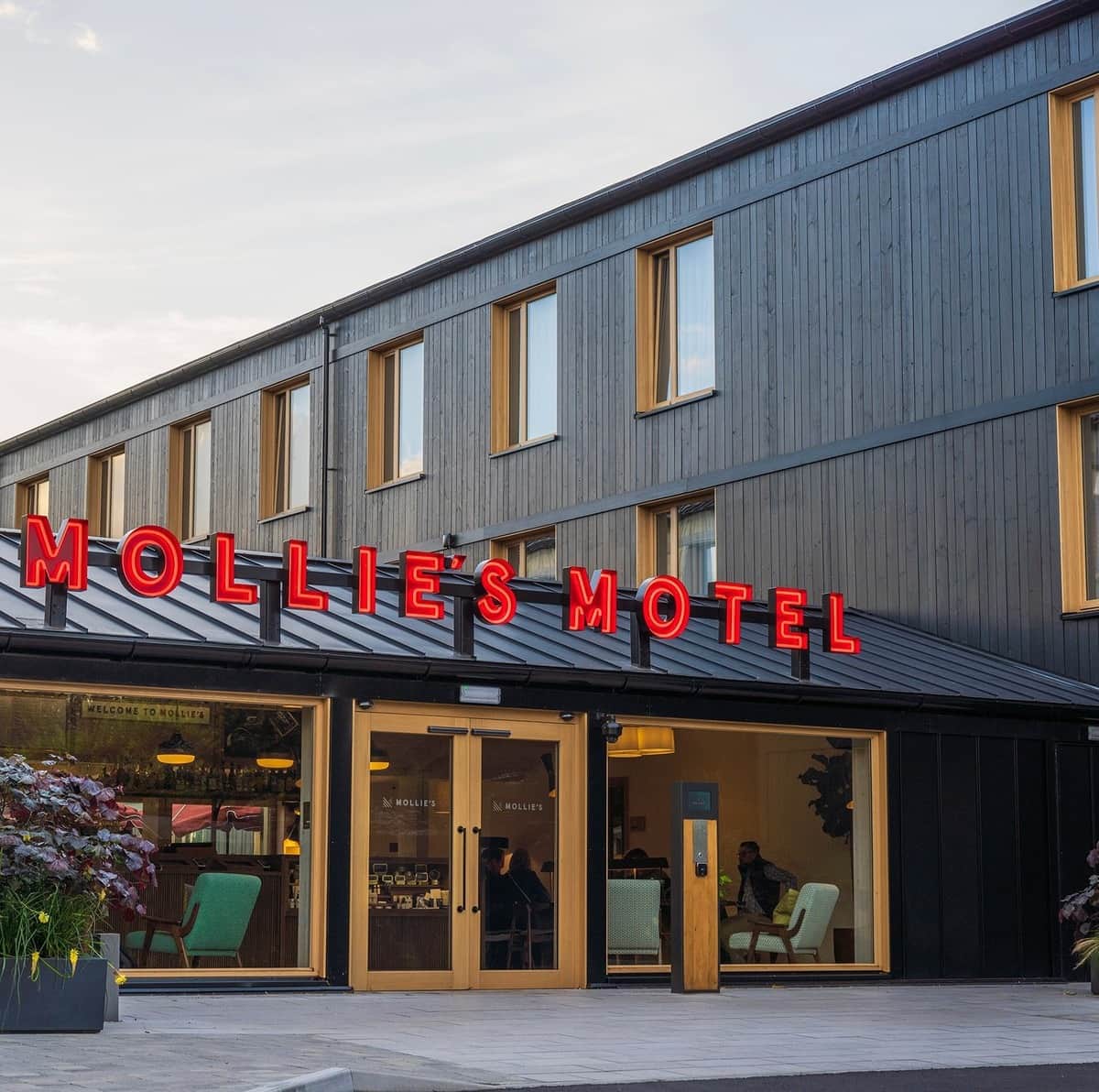 Classic timber windows and automated entrance doors at Mollie’s Motel