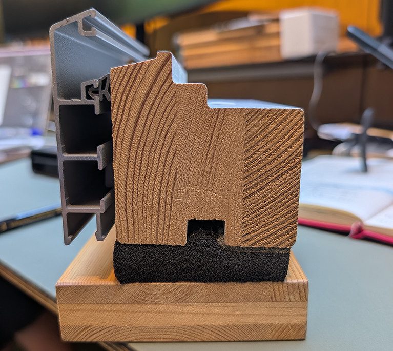 The perimeter joint needs separate weather, insulation and airtight functions, with external laps arranged to shed water