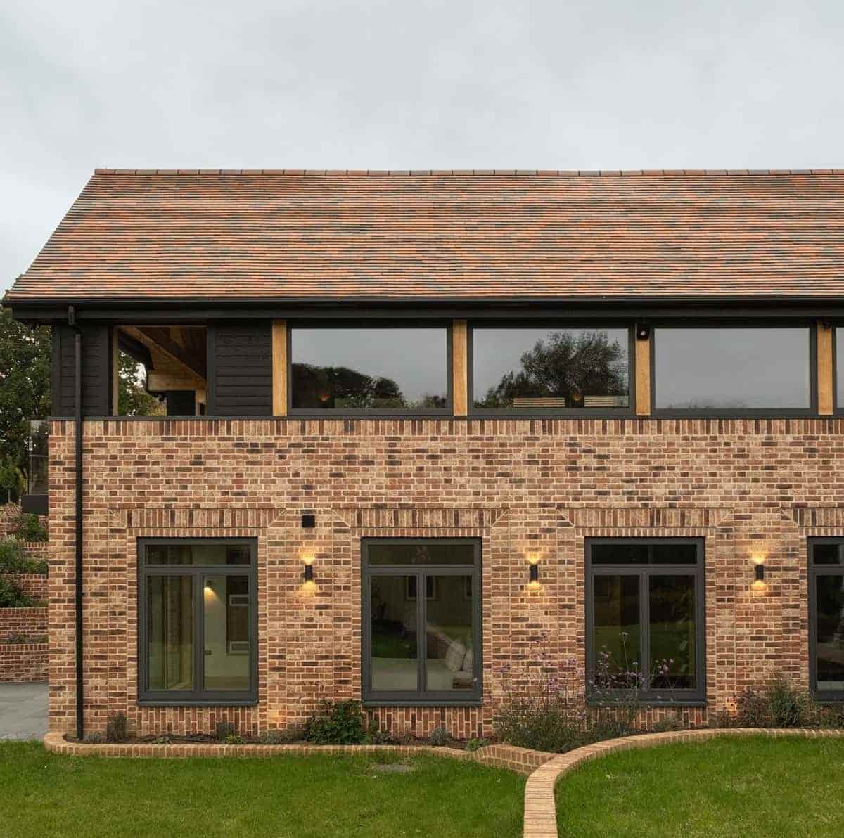 Meadow House timber aluminium composite oak windows and sliding door
