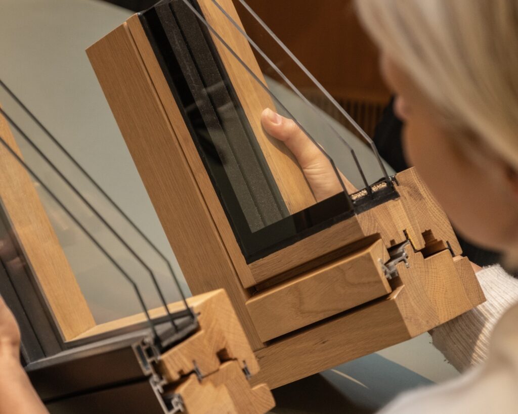 Section through a laminated timber window frame with glazing and seals